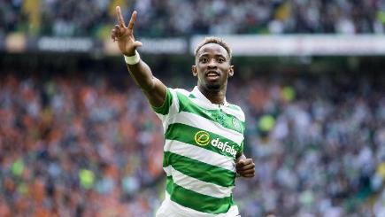 Moussa Dembele celebrates his hat-trick as Celtic comfortably saw off Rangers