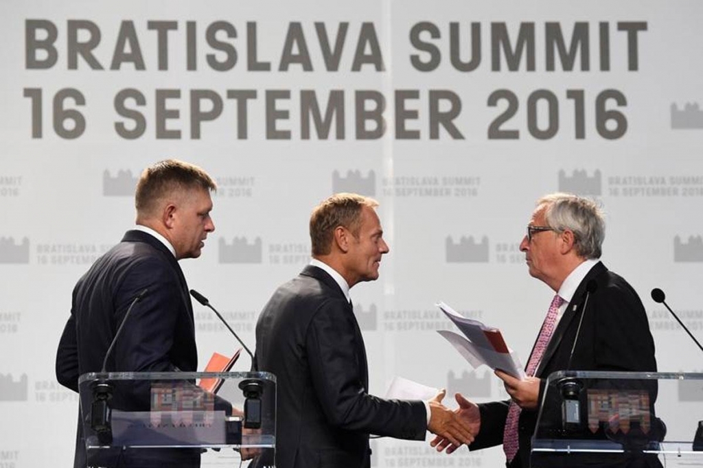 Slovakian Prime Minister Robert Fico European Council President Donald Tusk and European Commission President Jean Claude Juncker