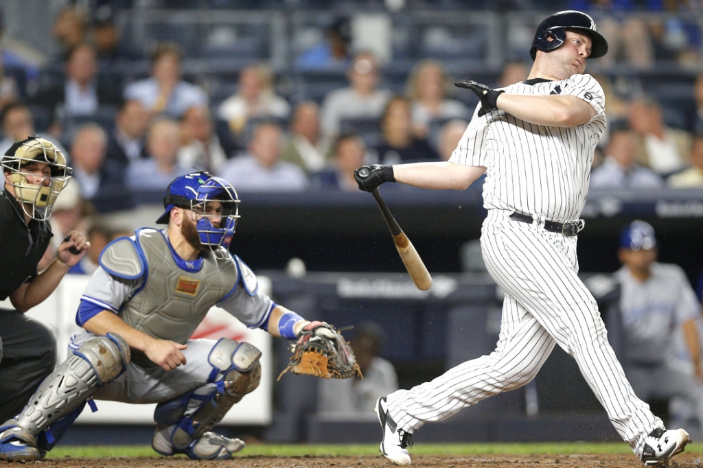 Brian Mc Cann belts one of his two homers during the Yankees’ 5-4