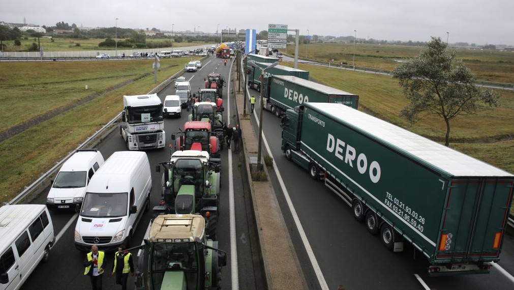 Truckers and farmers block the highway near Calais northern France Monday Sept. 5 2016