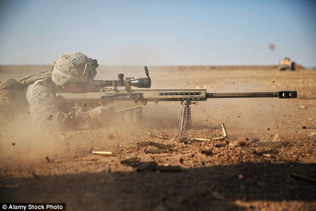 A British sniper took out a feared ISIS executioner as he prepared to murder several hostages by shooting a fuel tank on his back and incinerating him