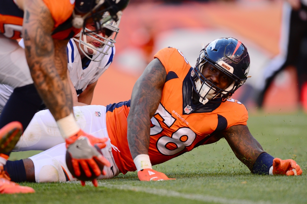 DENVER CO- SEPTEMBER 18 Outside linebacker Von Miller #58 of the Denver Broncos watches the ball after striping quarterback Andrew Luck #12 of the Indianapolis Colts in the fourth quarter of the game at Sports Authority Field at Mile High on September