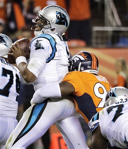 Carolina Panthers quarterback Cam Newton is sacked by Denver Broncos outside linebacker De Marcus Ware during the second half of an NFL football game Thursday Sept. 8 2016 in Denver