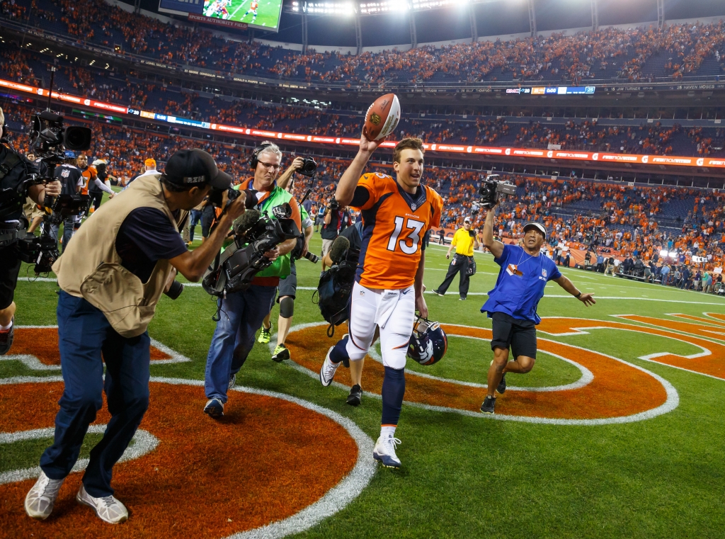 Sep 8 2016 Denver CO USA Denver Broncos quarterback Trevor Siemian celebrates following the game against the Carolina Panthers at Sports Authority Field at Mile High. The Broncos defeated the Panthers 21-20. Mandatory Credit Mark J. Rebilas-USA