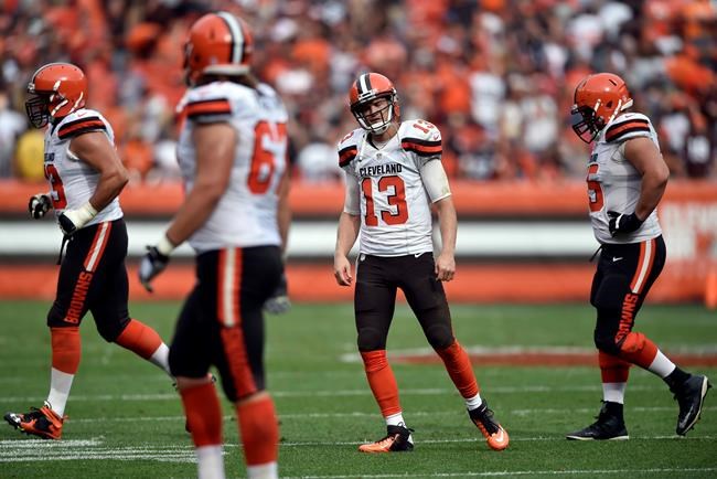 Cleveland Browns quarterback Josh Mc Cown reacts after his pass was intercepted by Baltimore Ravens inside linebacker C.J. Mosley in the final seconds of the second half of an NFL football game Sunday Sept. 18 2016 in Cleveland. (AP