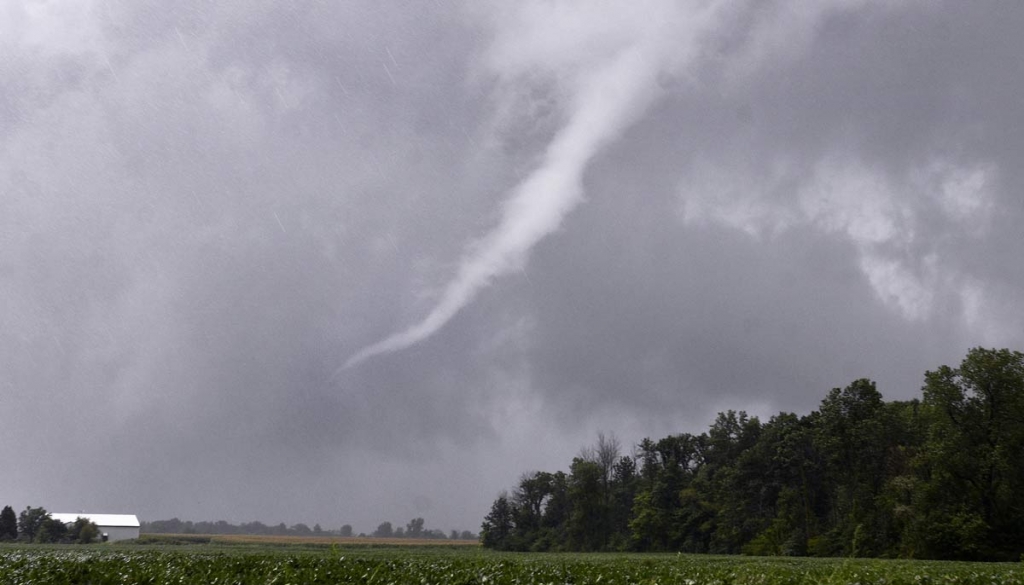 A funnel cloud near Van Buren Ind. moves east before breaking up as storms move through Grant County Wednesday Aug. 24 2016