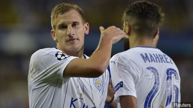 Leicester City's Riyad Mahrez is congratulated by Marc Albrighton as he walks off to be substituted