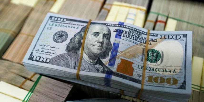 Dollar firm near two-week high investors seek more guidance on rates