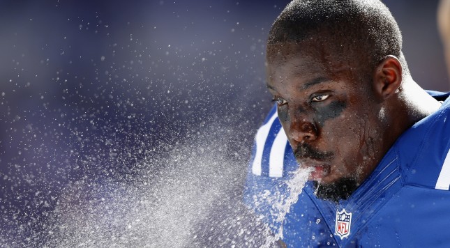 INDIANAPOLIS IN- SEPTEMBER 16 Vontae Davis #23 of the Indianapolis Colts spits water while cooling off during a timeout against the Minnesota Vikings during the game at Lucas Oil Stadium