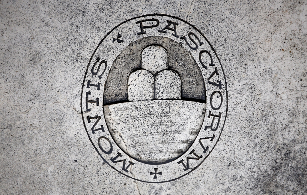 A logo of Monte dei Paschi di Siena bank is seen on the ground in downtown Siena Italy