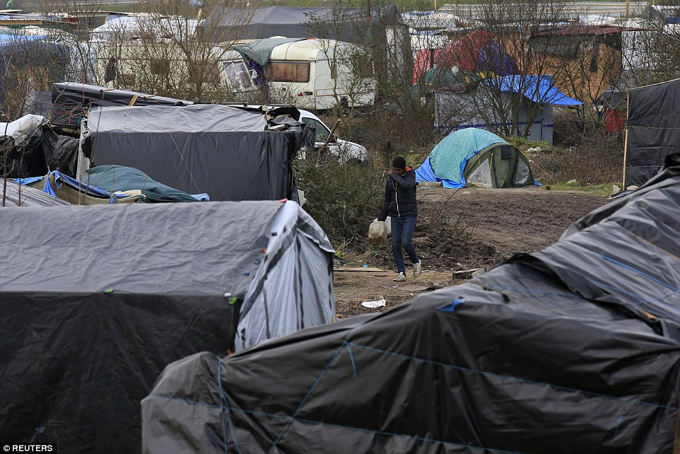 French interior minister vows to close Calais migrant camp