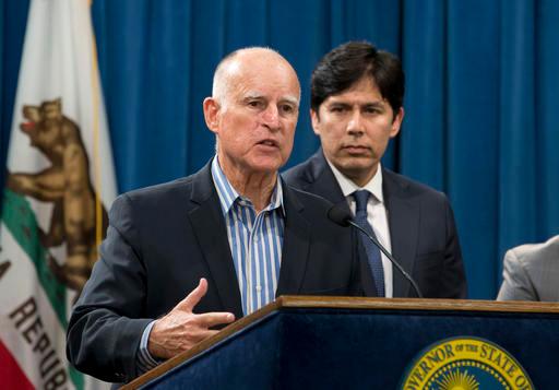 Calif. Gov. Jerry Brown announced that he would sign a pair of environmental bills approved by the Legislature during a news conference in Sacramento Calif. At right is Senate President Pro Tem Kevin de Leon D Los Angeles. Brown is set to extend the