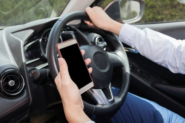 Call for action after phone use behind the wheel reaches ‘epidemic’ levels