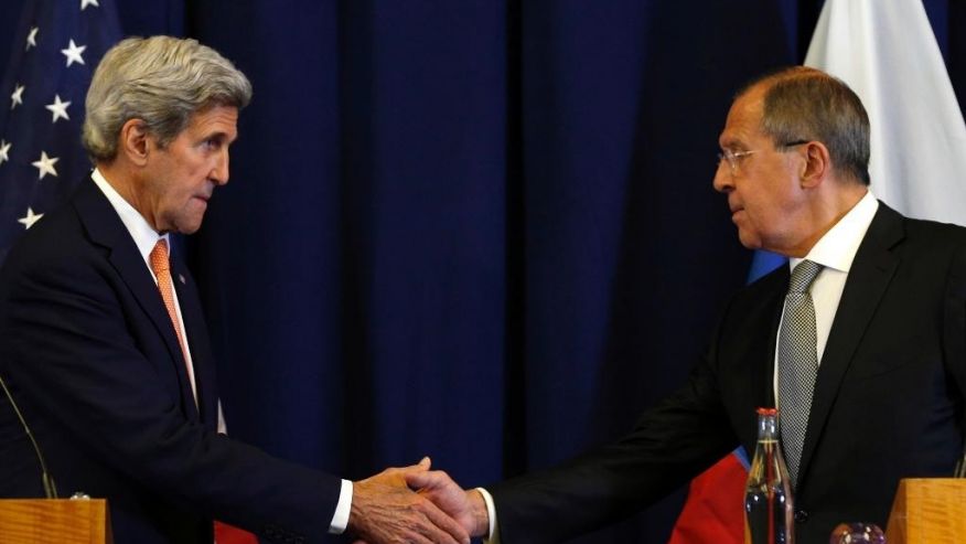 U.S. Secretary of State John Kerry left and Russian Foreign Minister Sergei Lavrov shakes hands at the conclusion of a news conference following their meeting to discuss the crisis in Syria in Geneva Switzerland. The deal