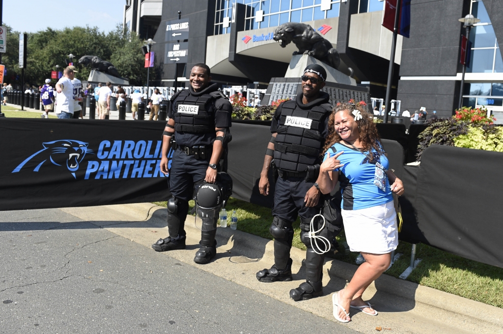 Sep 25 2016 Charlotte NC USA Carolina Panthers fan with police officers before the game at Bank of America Stadium. Mandatory Credit Bob Donnan-USA TODAY Sports