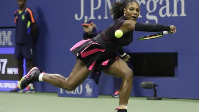 The Latest: Halep wins under the roof to advance at US Open