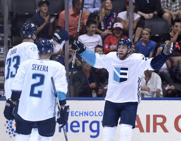 Team Europe's Zdeno Chara from left Andrej Sekera and Thomas Vanek celebrate Chara's goal during second period World Cup of Hockey action against Team Czec