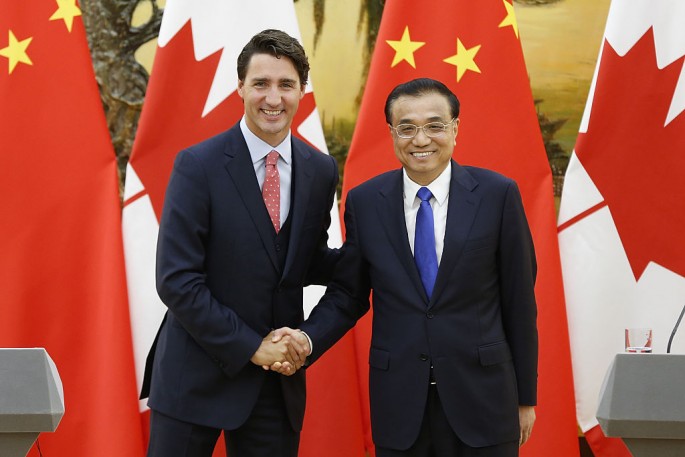 Canadian Prime Minister Justin Trudeau shakes hands with Chinese Premier Li Keqiang during a press conference at the Great Hall of the People in Beijing on Aug. 31 2016 in Beijing China