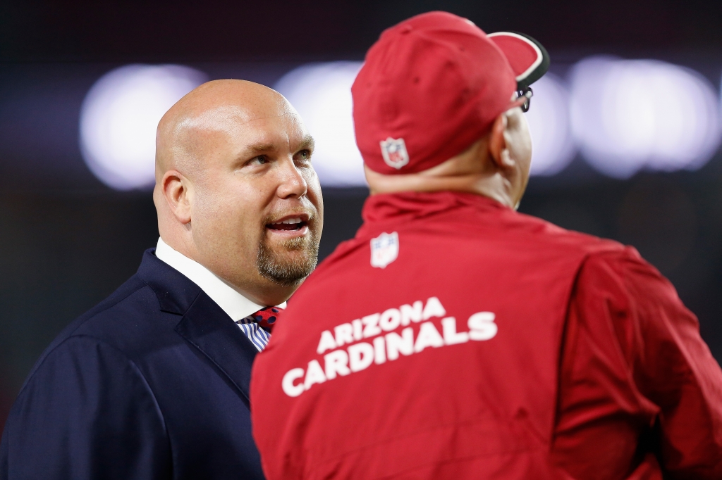 GLENDALE AZ- DECEMBER 21 General Manager Steve Keim of the Arizona Cardinals talks with head coach Bruce Arians prior to the NFL game against the Seattle Seahawks at the University of Phoenix Stadium