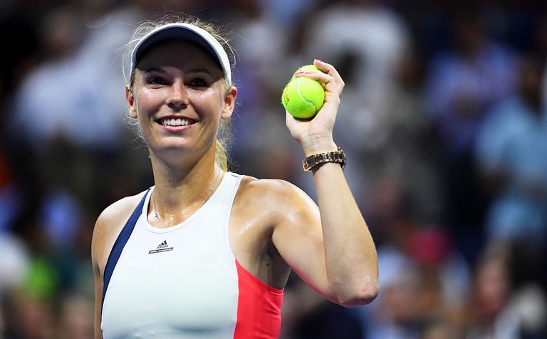 NEW YORK NY- SEPTEMBER 06 Caroline Wozniacki of Denmark celebrates defeating Anastasija Sevastova of Lativa during their Women's Singles Quarterfinals match on Day Nine of the 2016 US Open at the USTA Billie Jean King National Tennis Center on Septembe