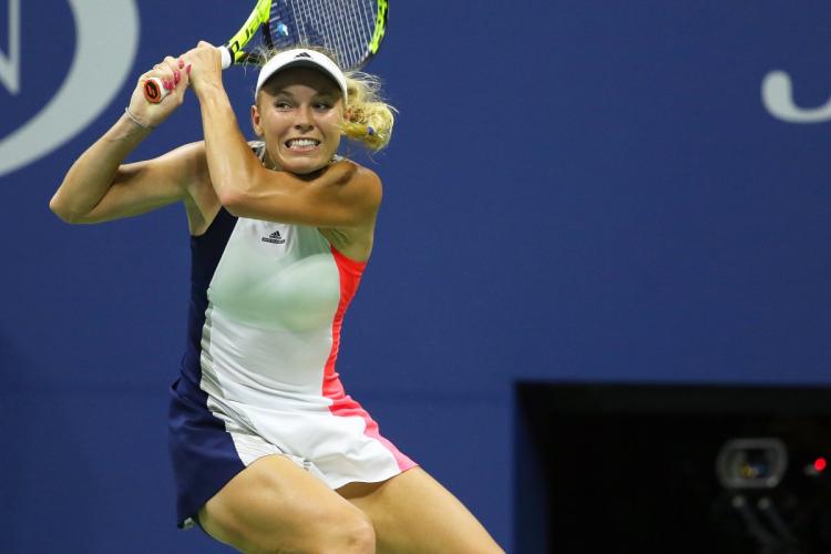 Caroline Wozniacki makes quick work of Anastasija Sevastova to cruise into the US Open seims