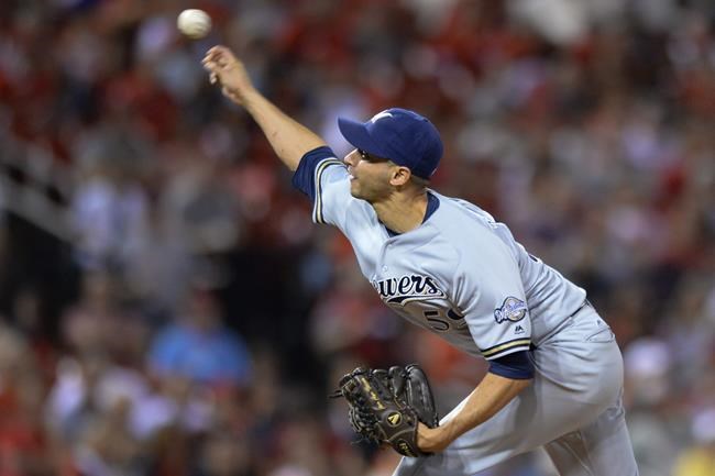 Milwaukee Brewers relief pitcher Carlos Torres pitches in the sixth inning of a baseball game against the St. Louis Cardinals on Saturday Sep. 10 2016 in St. Louis