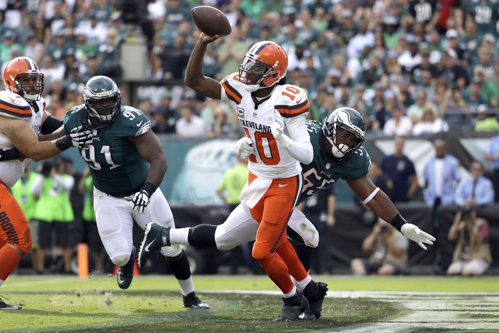 Cleveland Browns Robert Griffin III passes against Philadelphia Eagles Brandon Graham during the second half of an NFL football game Sunday Sept. 11 2016 in Philadelphia