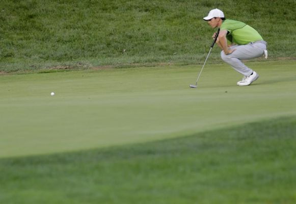 Rory McIlroy of Northern Ireland lines up