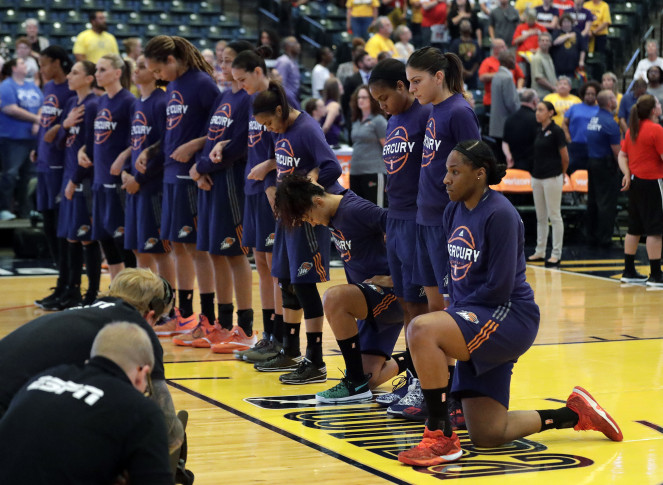 Catchings' career ends and Fever kneel in anthem protest