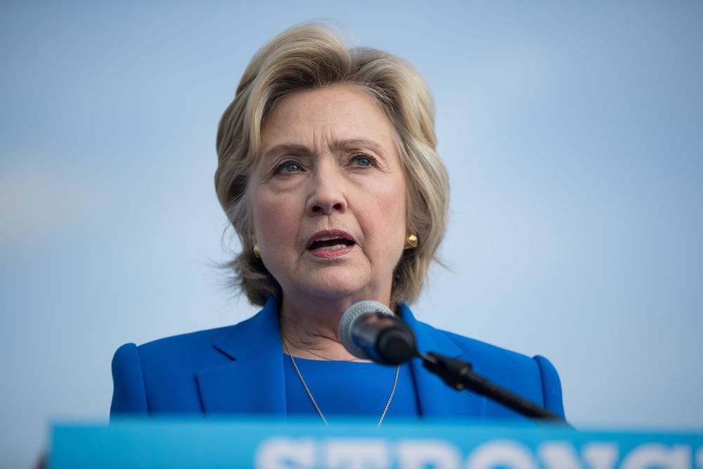 Democratic presidential candidate Hillary Clinton speaks to members of the media before boarding her campaign plane at Westchester County Airport in White Plains N.Y. Thursday Sept. 8 2016 to travel to Charlotte N.C. to attend a campaign rally. (A