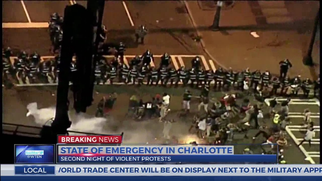 Protesters in Charlotte police shooting injure officers, shut highway