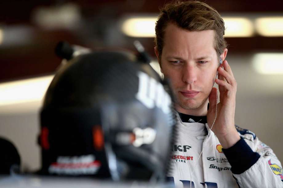 JOLIET IL- SEPTEMBER 17 Brad Keselowski driver of the #2 Miller Lite Ford prepares to practice for the NASCAR Sprint Cup Series Teenage Mutant Ninja Turtles 400 at Chicagoland Speedway