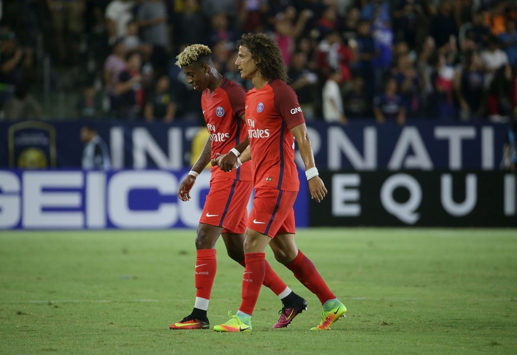 CARSON CA- JULY 30 Presnel Kimpembe #3 and David Luiz #32 of Paris Saint Germain shake hands as they walk to the sideline against Leicester City during the 2016 International Champions Cup at Stub Hub Center