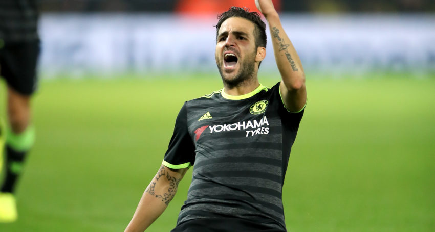 Chelsea's Cesc Fabregas celebrates scoring his side's fourth goal against Leicester