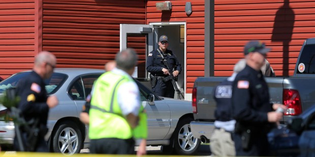 The Latest: Gunman Shoots 3 at a Complex Before Killing Self