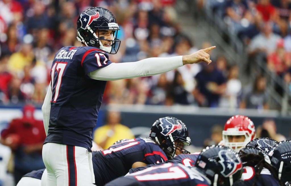 HOUSTON TX- SEPTEMBER 18 Brock Osweiler #17 of the Houston Texans calls a play in the second quarter of their game against the Kansas City Chiefs at NRG Stadium