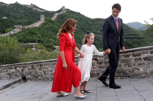 Canadian Prime Minister Justin Trudeau his wife Sophie Gregoire and daughter Ella Grace walk along a section of the Great Wall of China in Beijing on Thursday