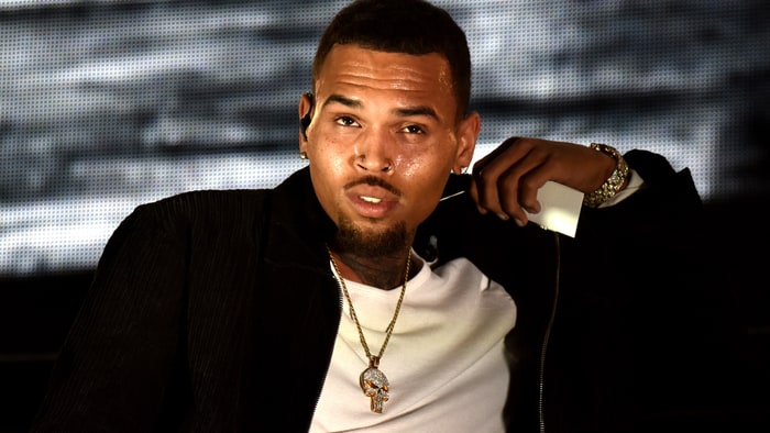 Chris Brown's lawyer has claimed the woman who accused the singer of pointing a gun at her'fabricated her story.        
      Credit Tim Mosenfelder  Getty