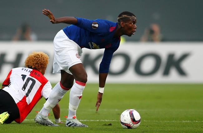 United's Paul Pogba controls the ball during the Group A Europa League match between Feyenoord and Manchester United at the De Kuip stadium in Rotterdam Netherlands Thursday Sept. 15 2016