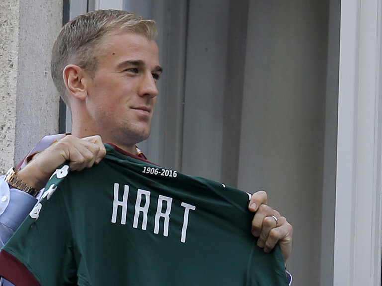 Joe Hart poses upon his arrival for a medical check before joining the Torino