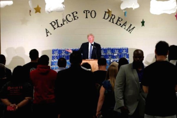 Republican presidential nominee Donald Trump speaks to a small group at the Bethel United Methodist Church in Flint Michigan U.S