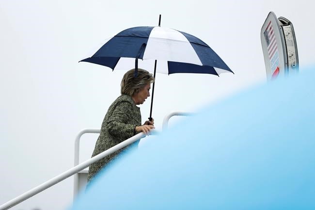 Democratic presidential candidate Hillary Clinton boards her campaign plane at Westchester County Airport in White Plains N.Y. Monday Sept. 19 2016