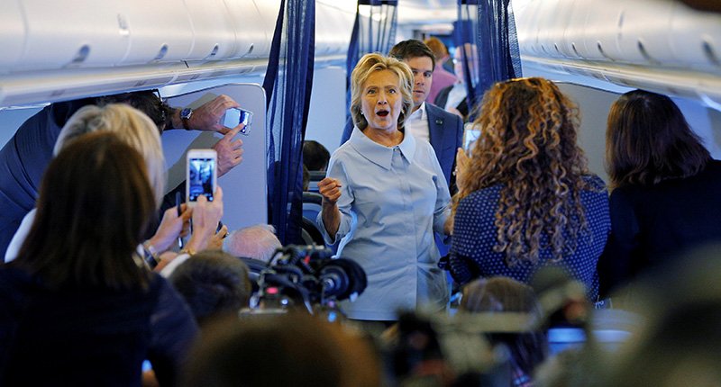 U.S. Democratic presidential nominee Hillary Clinton greets members of the news media on her newly unveiled campaign plane at the Westchester County Airport in White Plains New York U.S