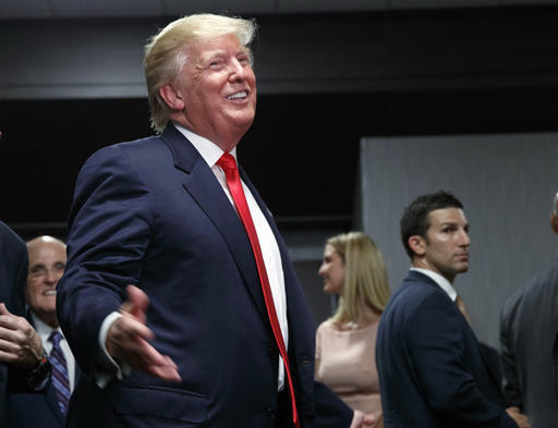 Republican presidential candidate Donald Trump smiles after speaking to an overflow room during a campaign rally Tuesday Sept. 6 2016 in Greenville N.C