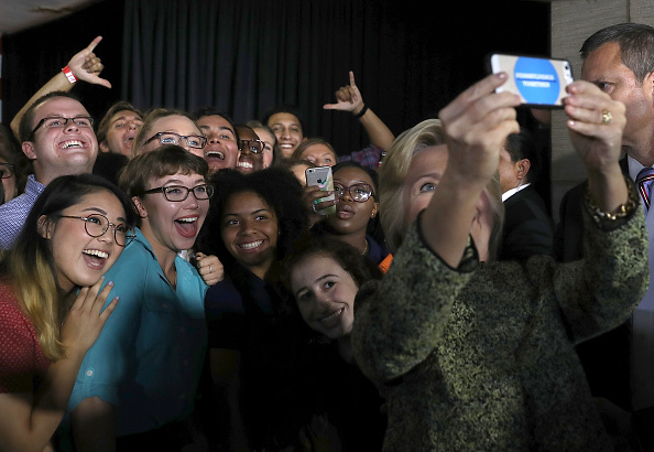 Democratic presidential nominee former Secretary of State Hillary Clinton takes a selfie with supporters after delivering a speech at Temple University