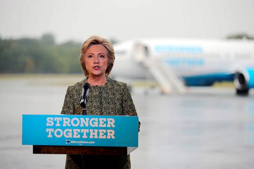 US Democratic presidential candidate Hillary Clinton speaks to the media before boarding her campaign plane at the Westchester County airport in White Plains New York. Reuters  Carlos Barria