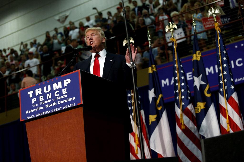 Republican presidential nominee Donald Trump speaks to supporters at a rally on Sept. 12 2016 at U.S. Cellular Center in Asheville North Carolina. He criticized Democratic rival Hillary Clinton for saying that half of his supporters belong in a'basket