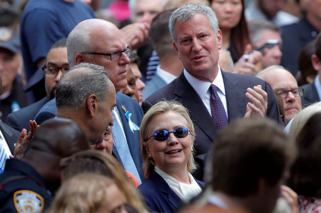 Image U.S. Democratic presidential candidate Hillary Clinton and New York Mayor Bill de Blasio attend ceremonies to mark the 15th anniversary of the September 11 attacks at the National 9/11 Memorial in New York