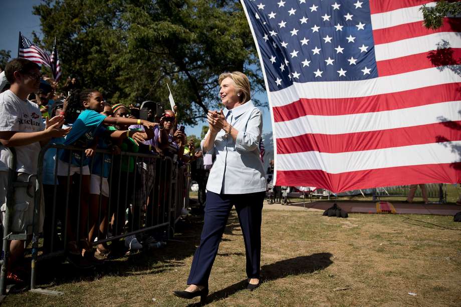 Democratic presidential candidate Hillary Clinton greets supporters at a Labor Day event in Cleveland. Her rival Donald Trump also campaigned in the city