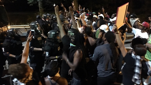 Police and protesters in Charlotte